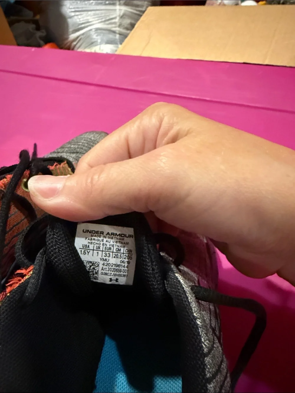 Under Armour Kids' Black and Gray Sneakers with Orange Accent